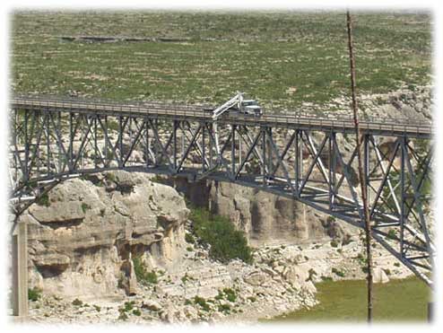 view of work truck on bridge
